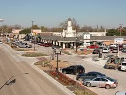 Crew members finishing a commercial concrete pour in Duncanville, TX.