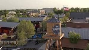 Crew members finishing a commercial concrete pour in Burleson, TX.