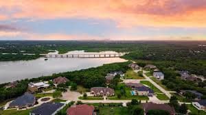 Crew members finishing a commercial concrete pour in Corinth, TX.