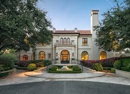 Crew members finishing a commercial concrete pour in Highland Park, TX.