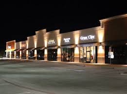 Crew members finishing a commercial concrete pour in Kaufman, TX.