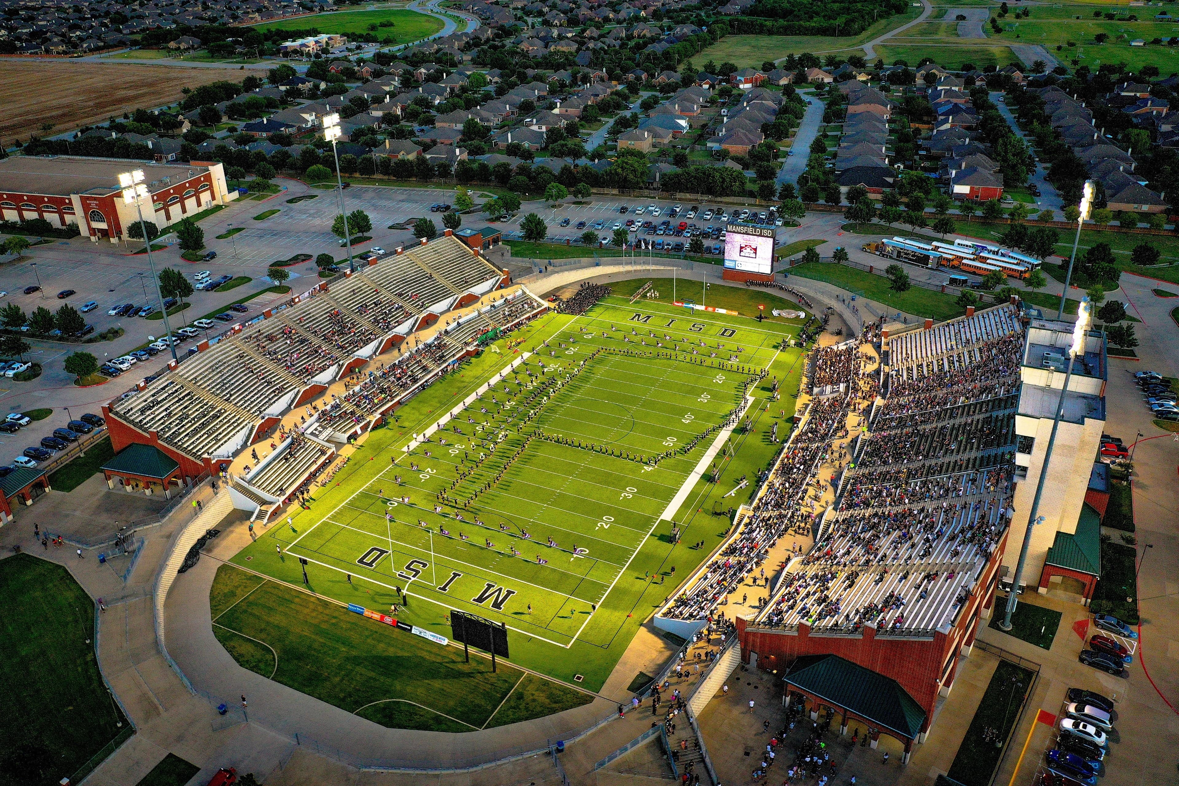 Crew members finishing a commercial concrete pour in Prosper, TX.