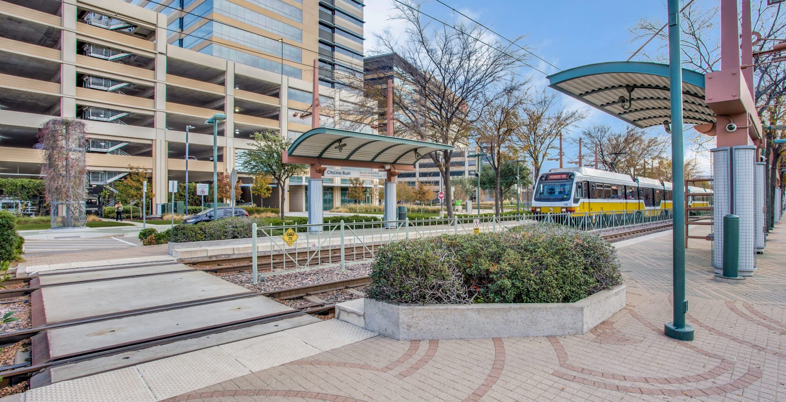 Crew members finishing a commercial concrete pour in Richardson, TX.