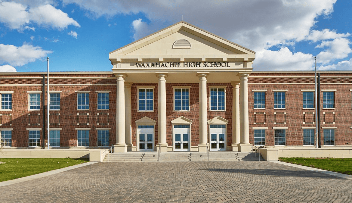 Crew members finishing a commercial concrete pour in Waxahachie, TX.